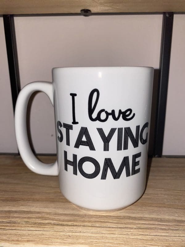 Custom mug with I Love STAYING HOME text