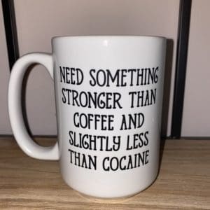 Custom mug with need something stronger than coffee and slightly less than cocaine text