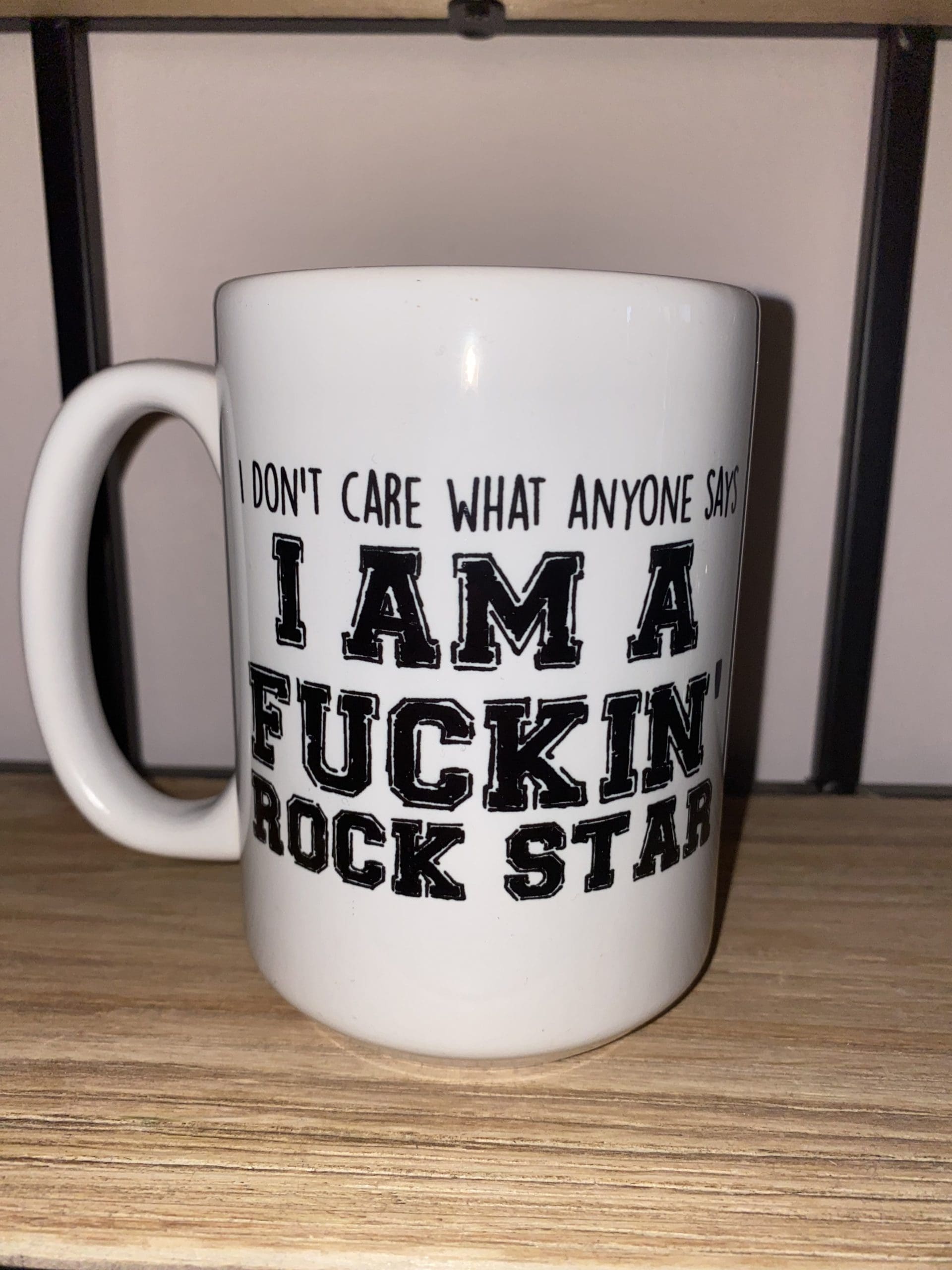 Custom mug with I don't care what anyone says I'm a fuckin' rock star text