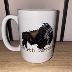 Custom mug with a drawn buffalo above South Dakota text